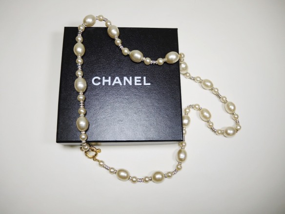 An Authentic Long Chanel Pearl Necklace CCs set with seed Pearls
